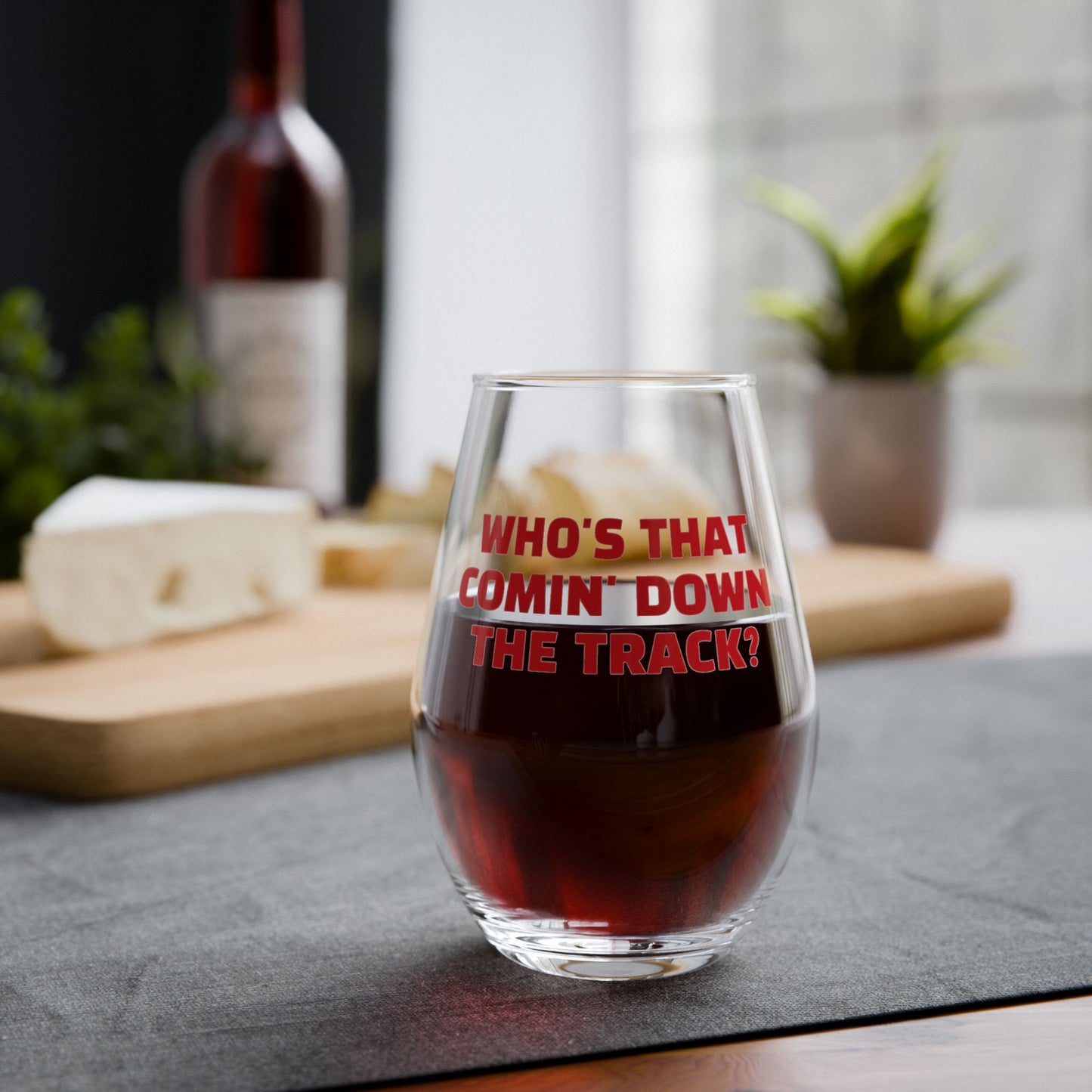 Stemless Wine Glass with "WHO'S THAT COMIN' DOWN THE TRACK" Quote | Perfect Gift for DAWG Lovers.