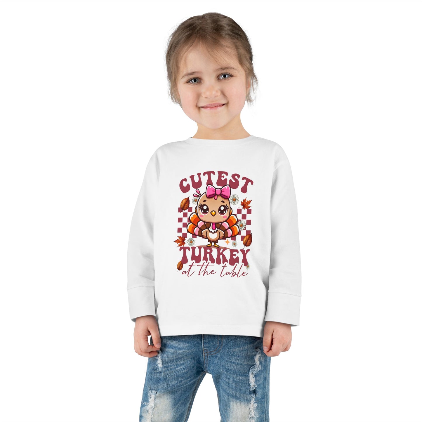 Cute Toddler Long Sleeve Tee - "Cutest Turkey At The Table" Thanksgiving Shirt